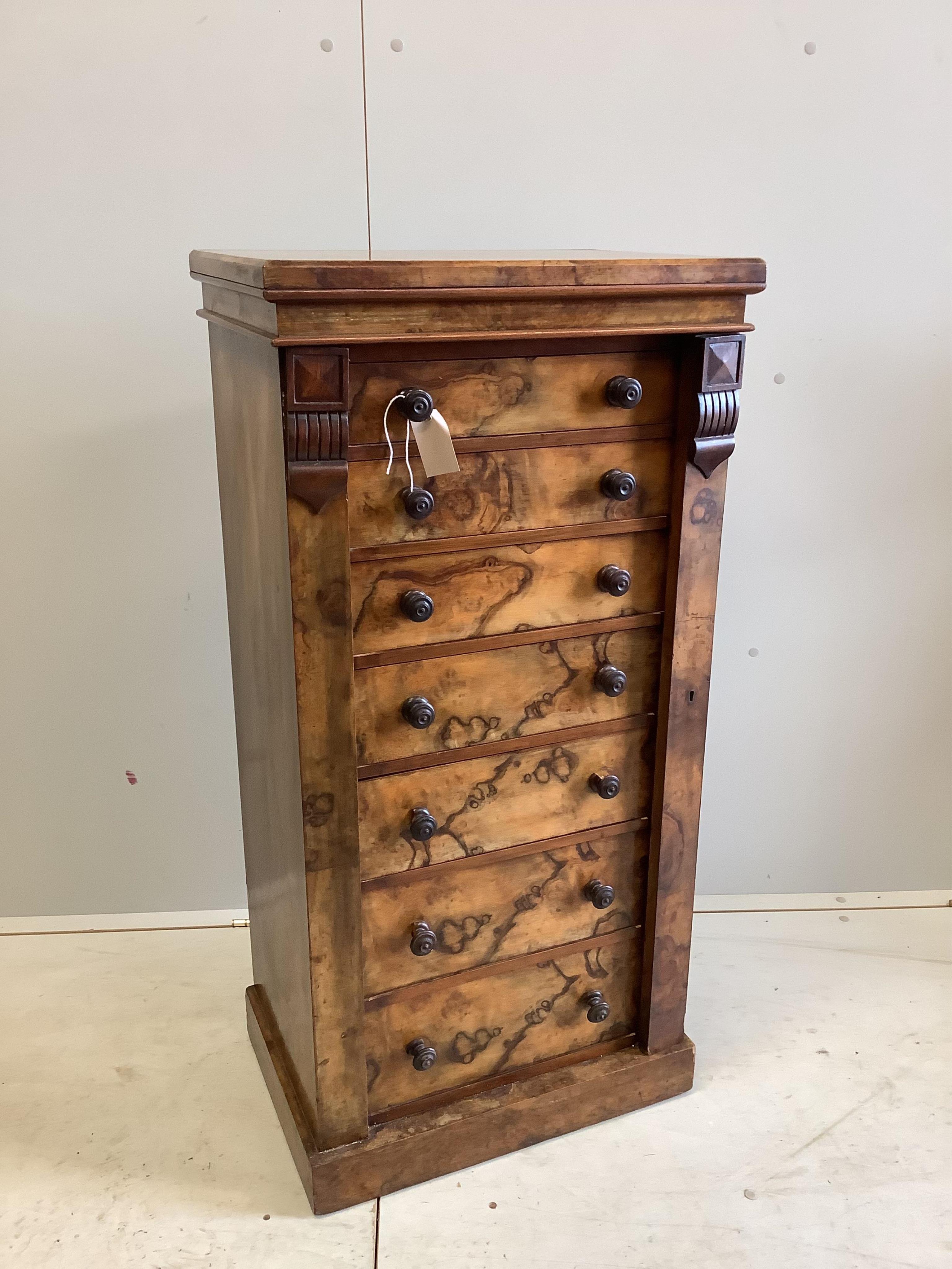 A Victorian walnut Wellington chest, width 52cm, depth 37cm, height 108cm. Condition - fair to good